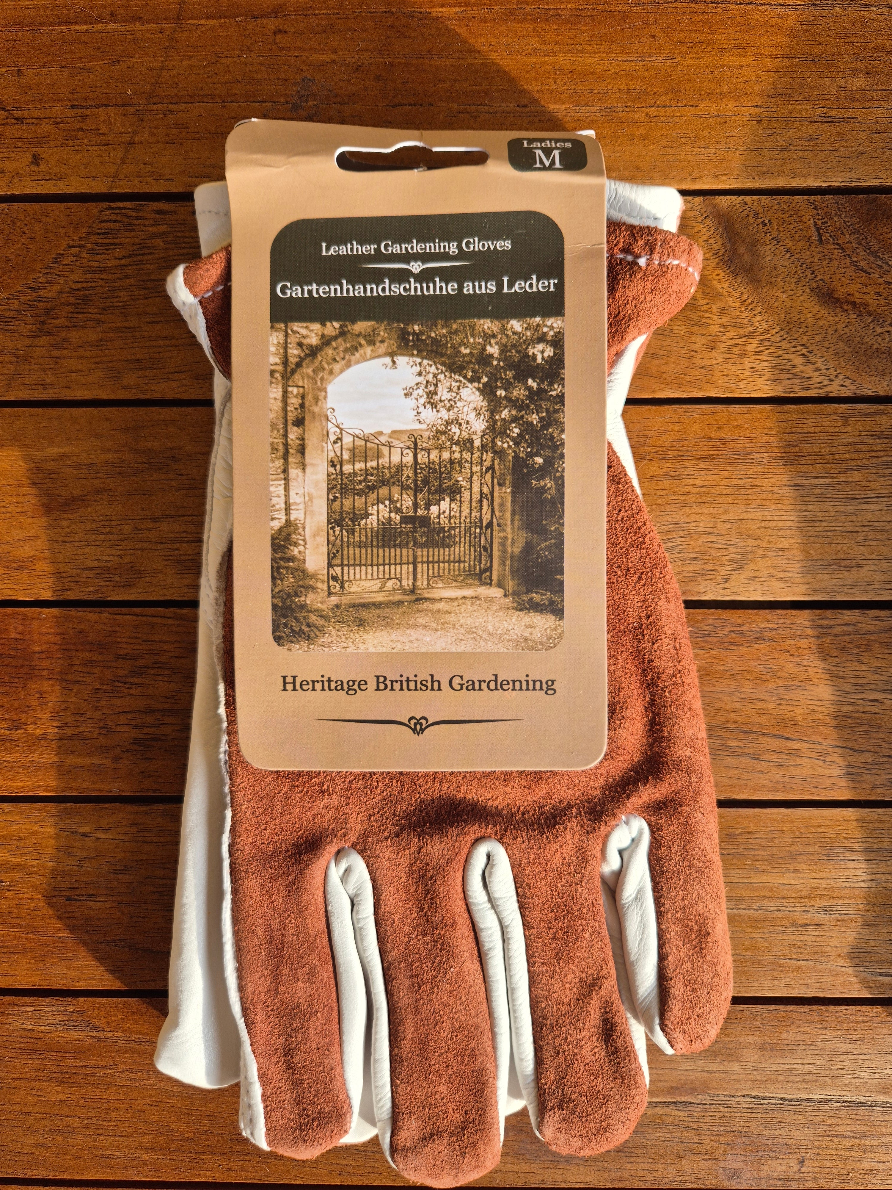 Ladies medium sized gardening gloves.