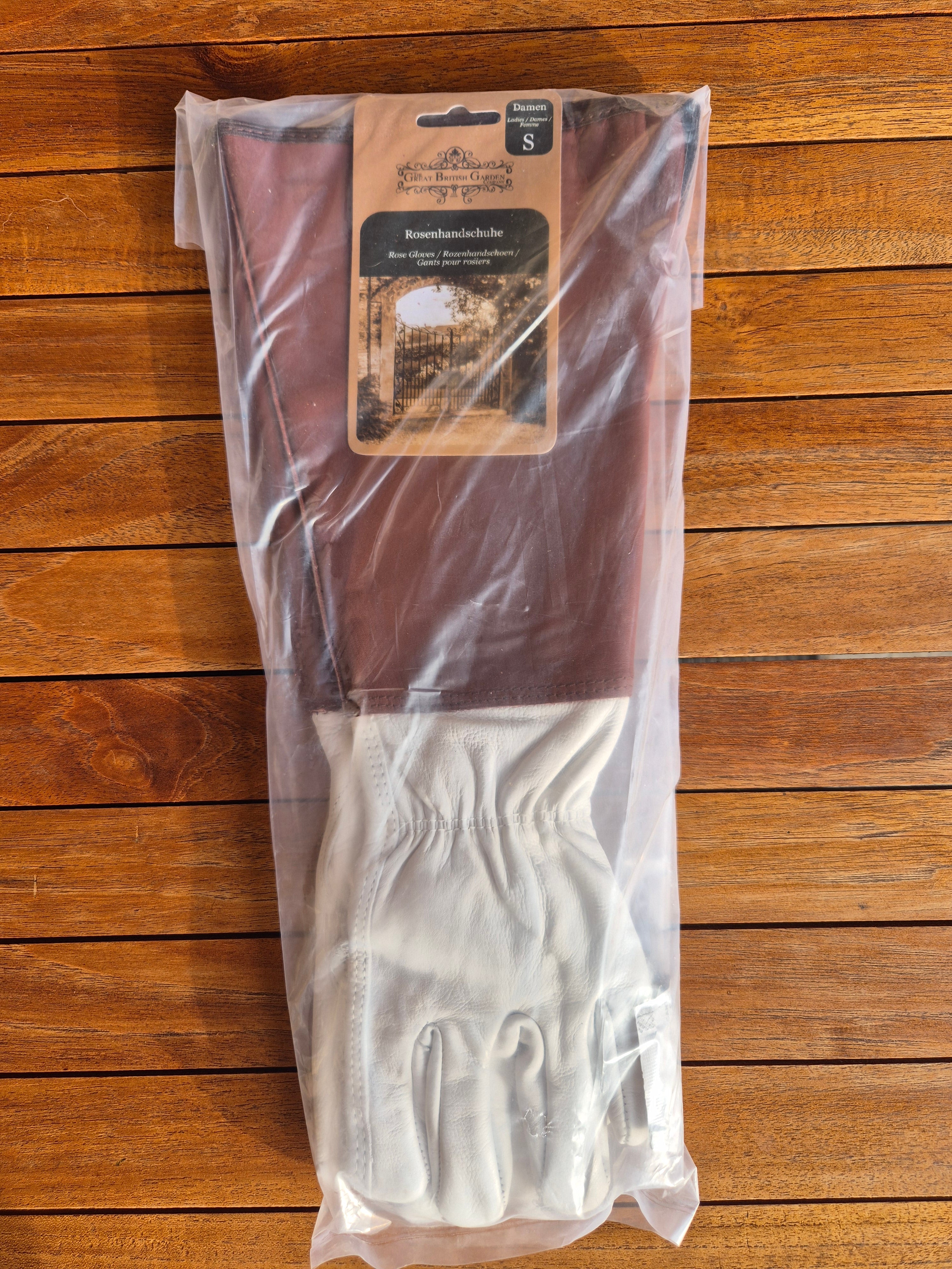 Ladies small leather rose gloves with long sleeve.