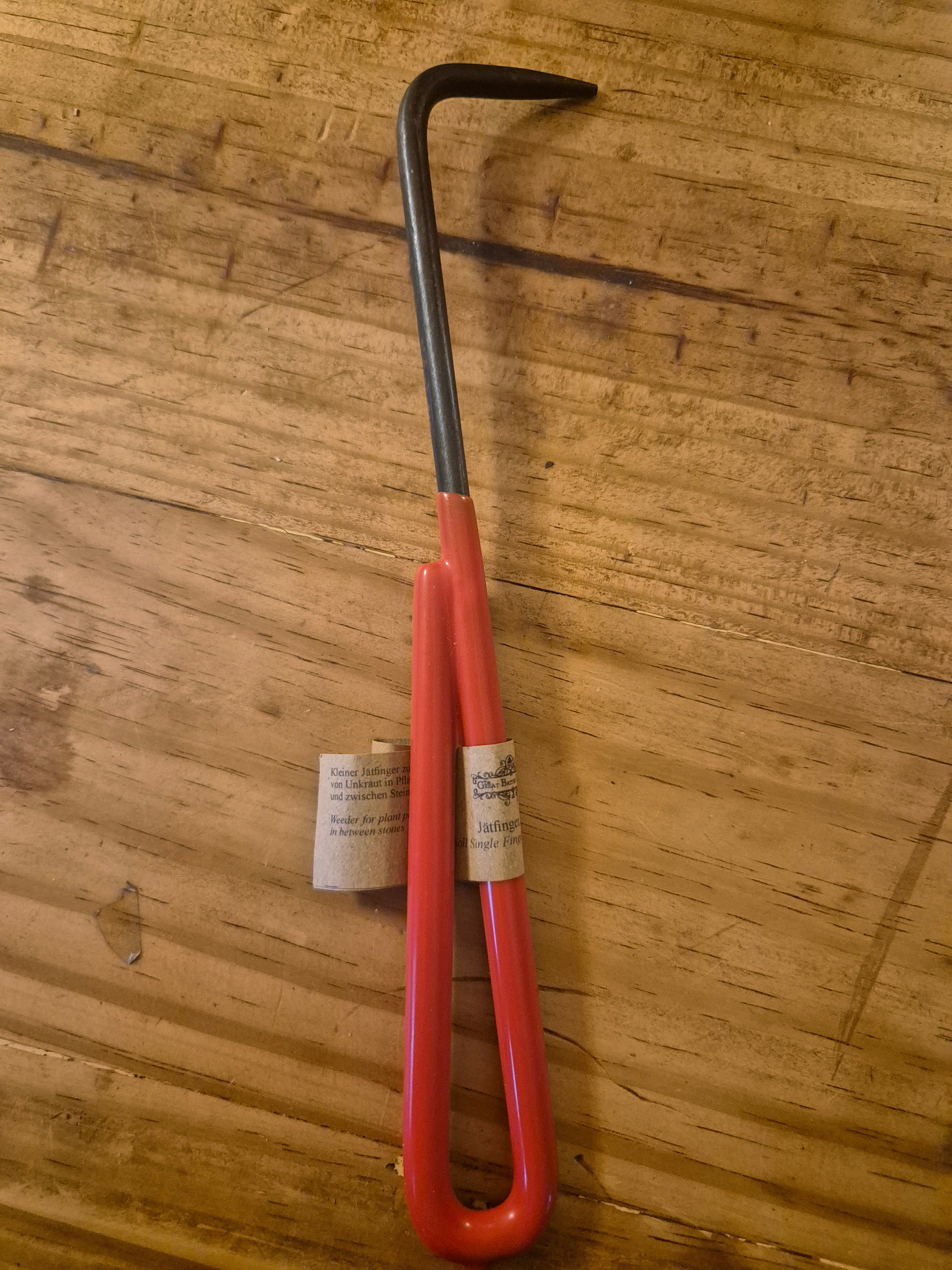 Small single finger weeder